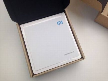 小米路由器mini版真机图评测:神似苹果触控板