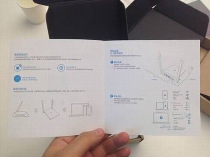小米路由器mini版真机图评测:神似苹果触控板