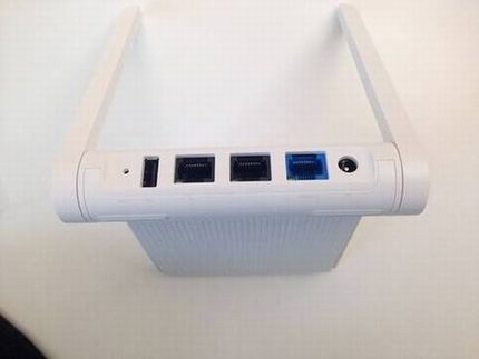 小米路由器mini版真机图评测:神似苹果触控板