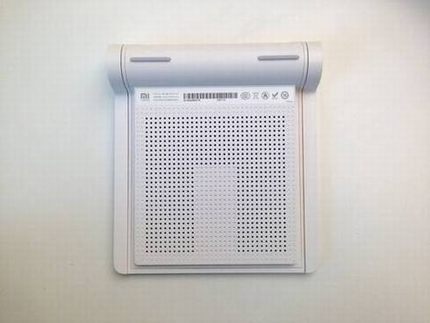 小米路由器mini版真机图评测:神似苹果触控板